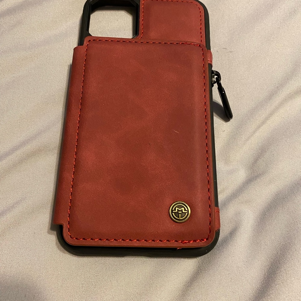 Case me IPhone 11 red leather wallet case.